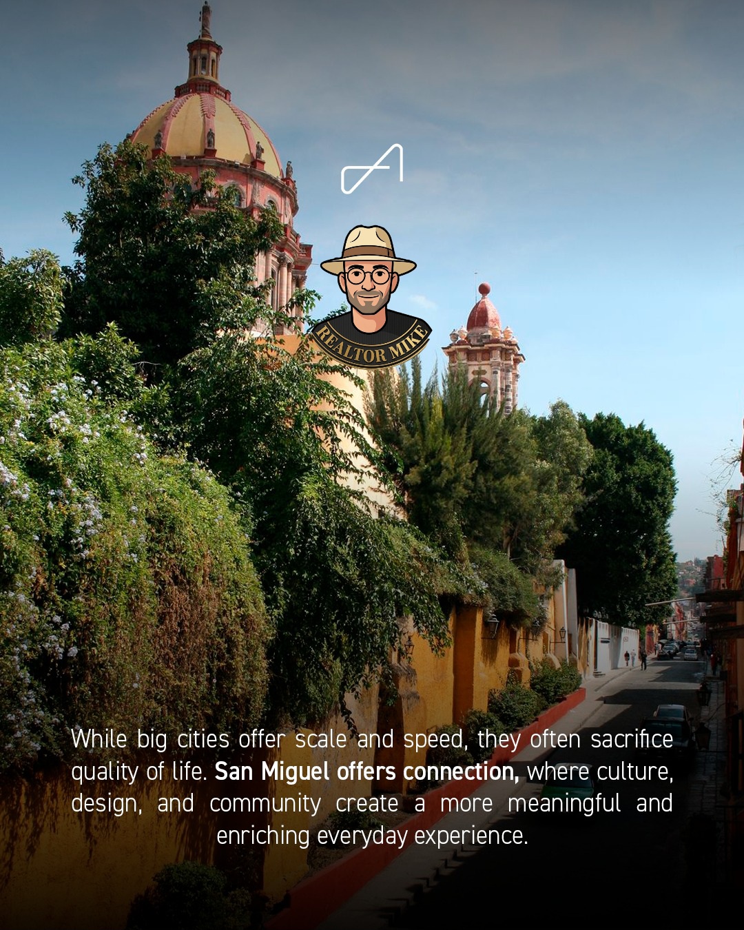 View of San Miguel rooftops & a colonial dome. Connection in everyday life.